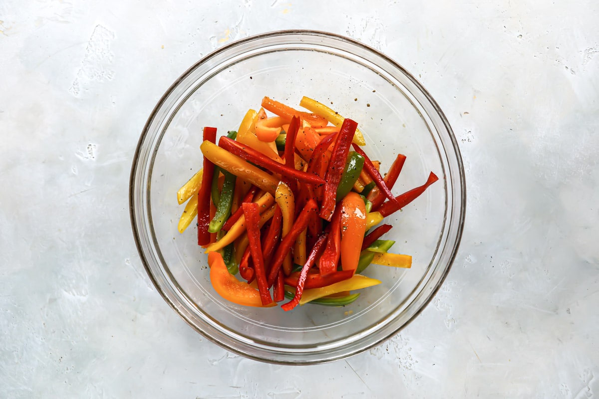 Pepper slices in a clear glass bowl.