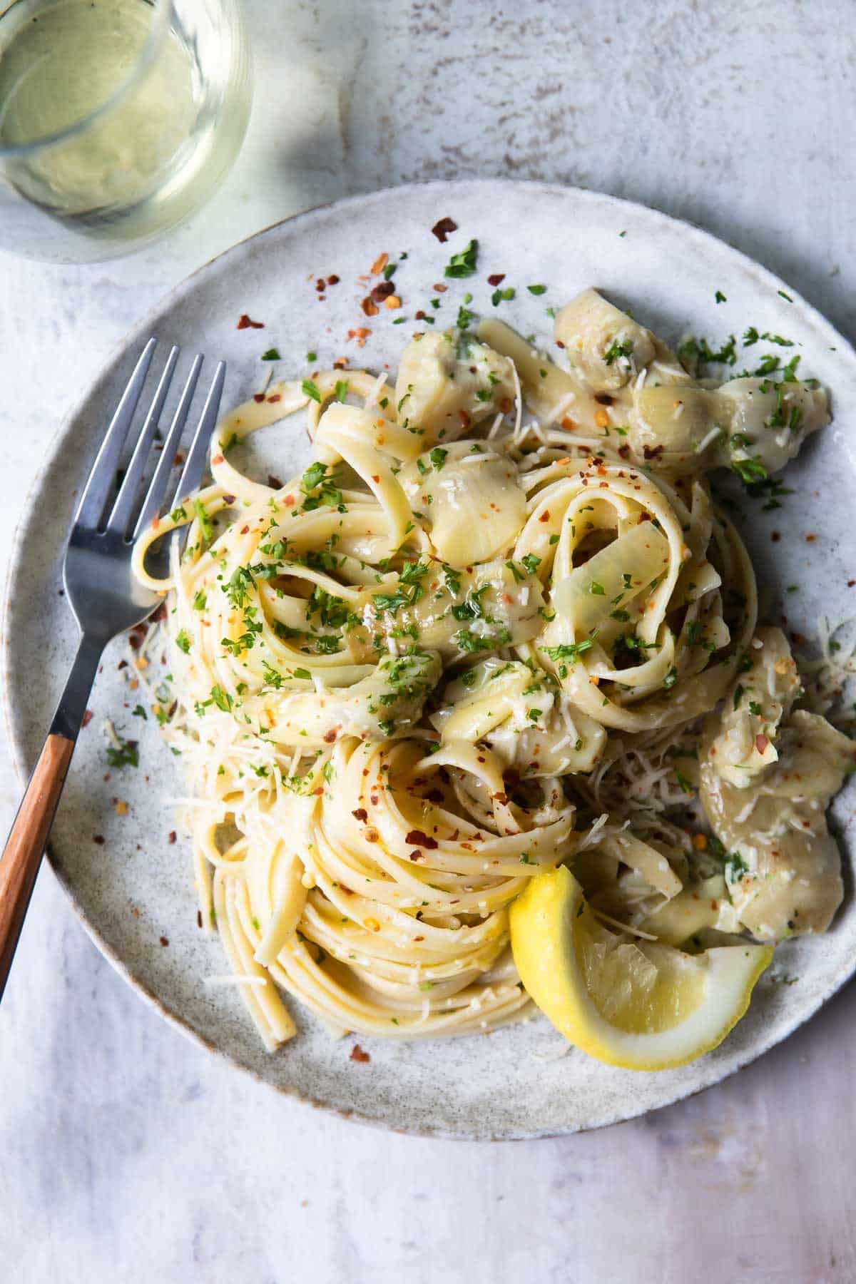 A plate full of artichoke pasta.