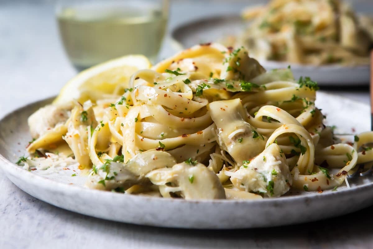 A plate full of artichoke pasta.