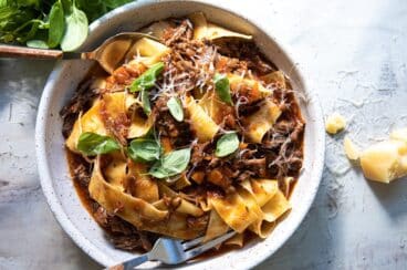 Beef ragu in a gray bowl.