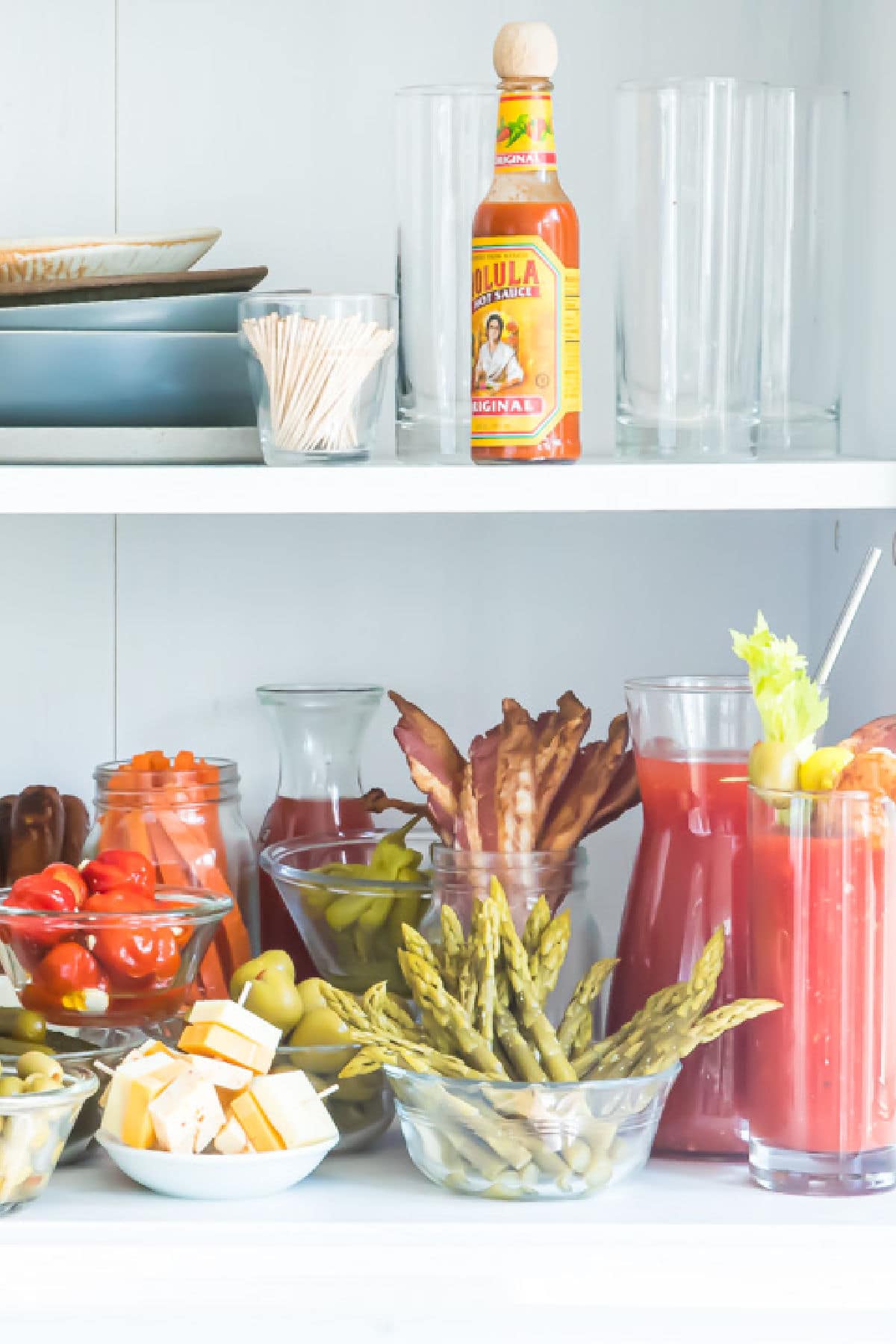 A bloody mary bar with all the garnishes.