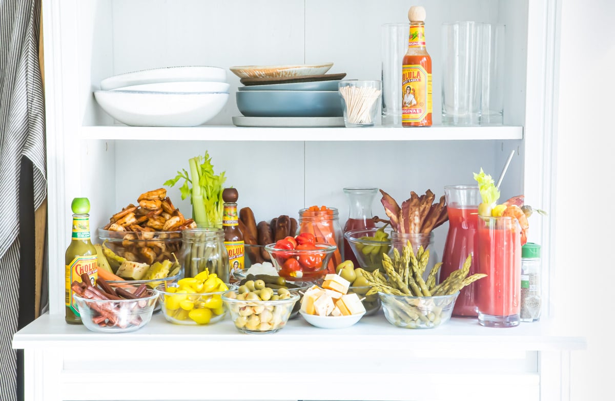 A bloody mary bar with all the garnishes.