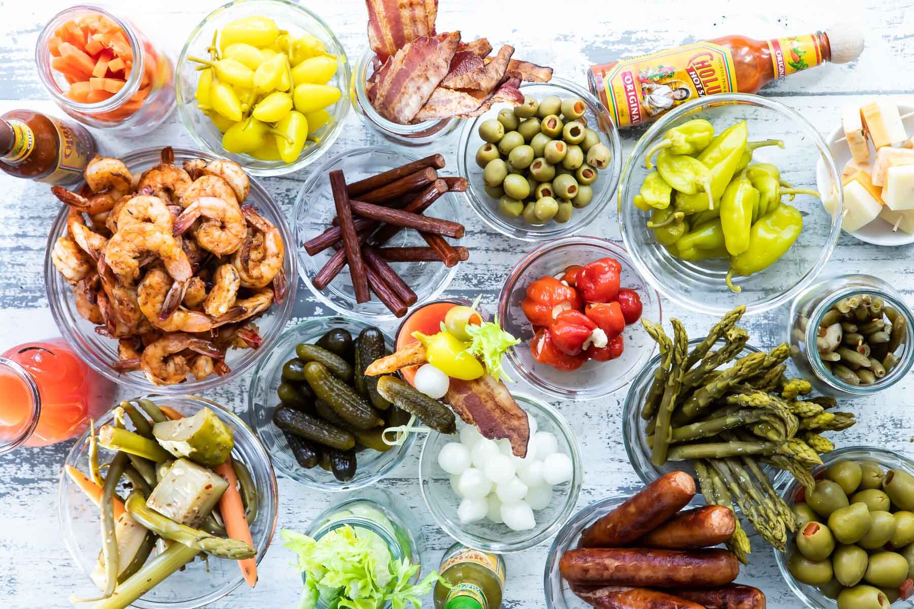A bloody mary bar with all the garnishes.