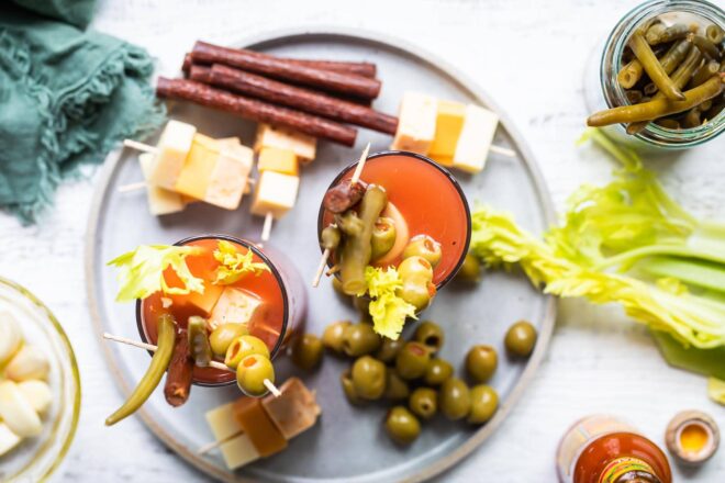 Bloody Mary garnishes on a plate.