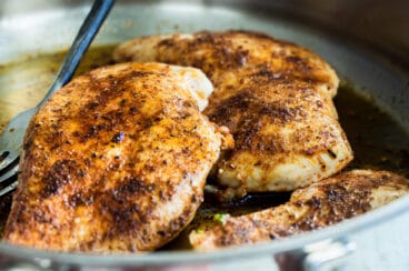 Cajun chicken in a skillet.