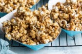Caramel corn in a paper boat.