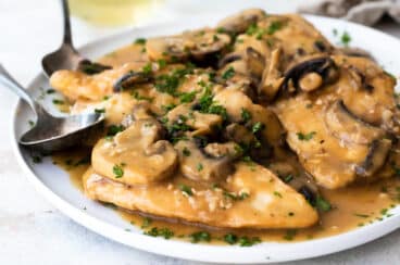 A platter of Chicken Marsala.