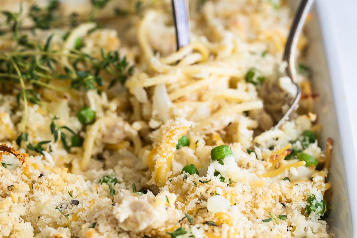 Chicken tetrazzini in a white baking dish.