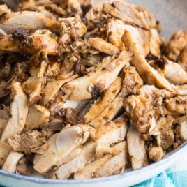 Chipotle chicken in a white serving bowl.