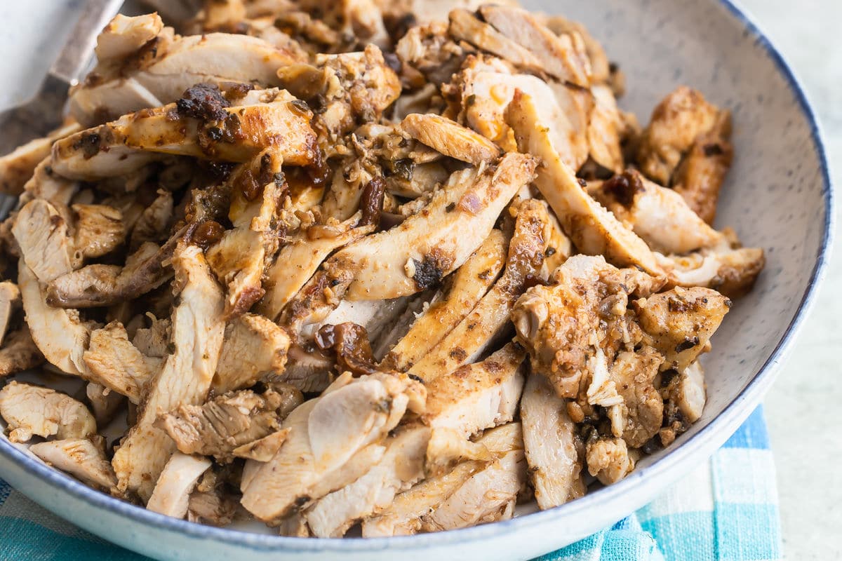 Chipotle chicken in a white serving bowl.