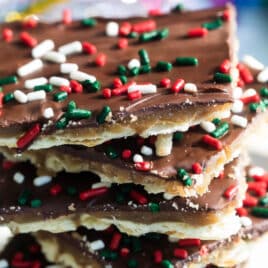 A stack of Christmas crack on a plate.