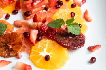 Citrus salad on a white plate.