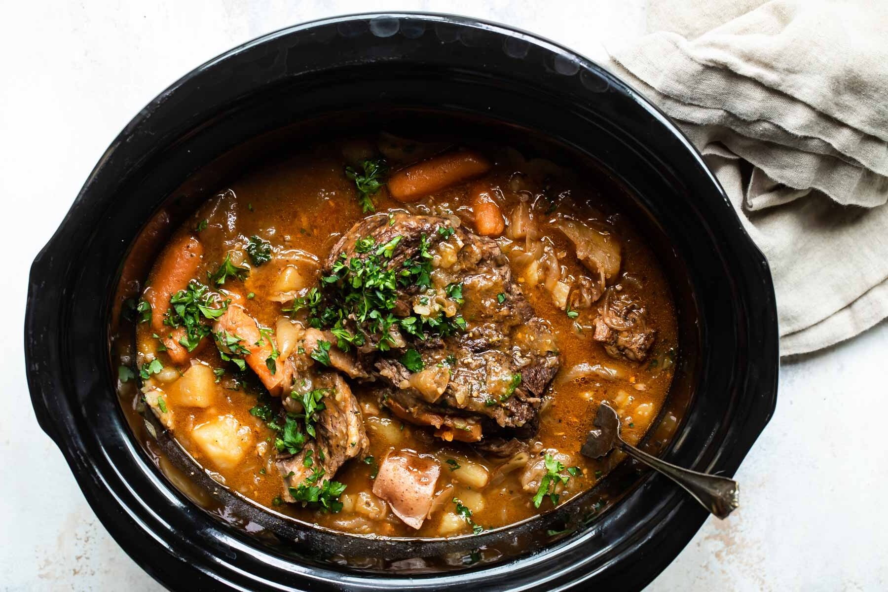 Pot roast in a slow cooker.