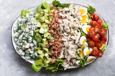 Cobb salad on an oval platter.