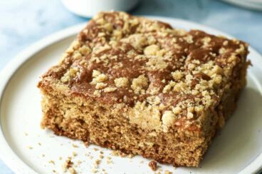 A piece of coffee cake on a small plate.