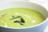 A bowl of cream of aspargus soup.