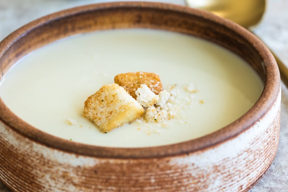A bowl of Cream of Cauliflower Soup.