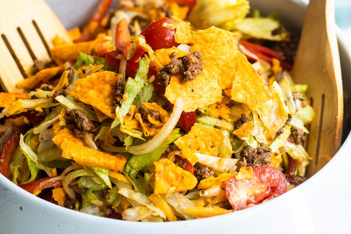 A white bowl filled with Dorito Taco Salad.
