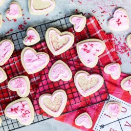 Easy frosted valentine cookies on a cooling rack.