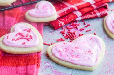 Easy frosted valentine cookies on a cooling rack.