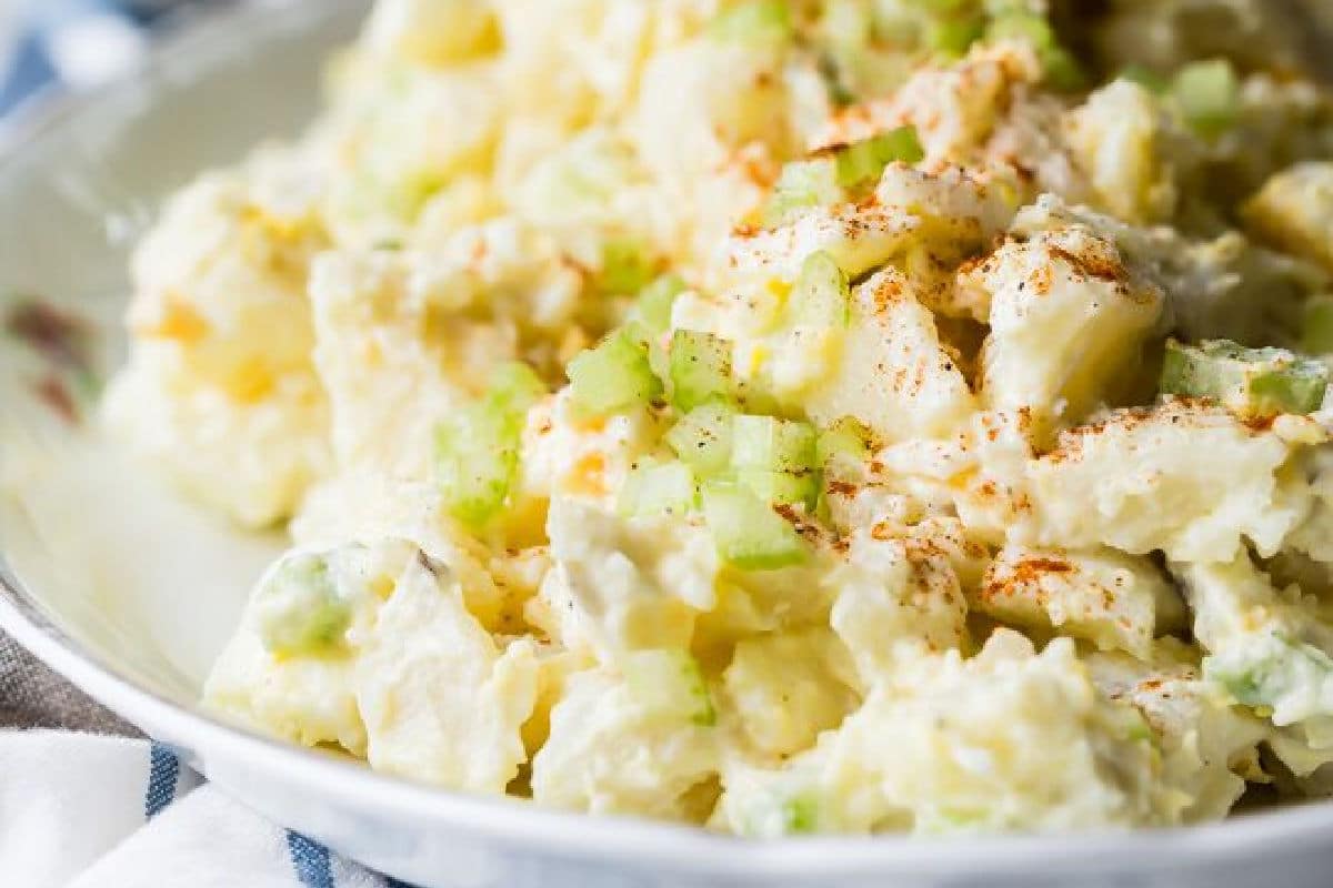 Potato salad on a white plate.