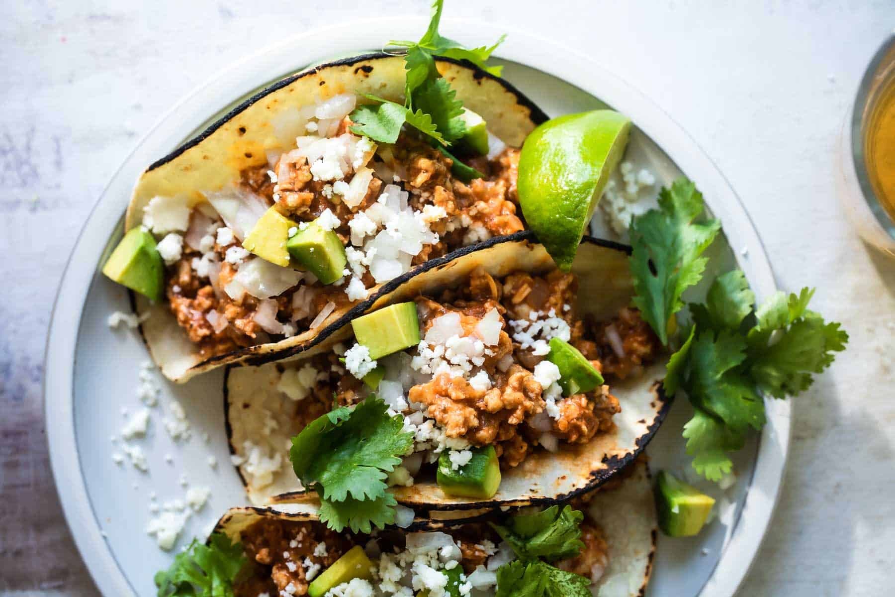 A plate of ground chicken tacos.