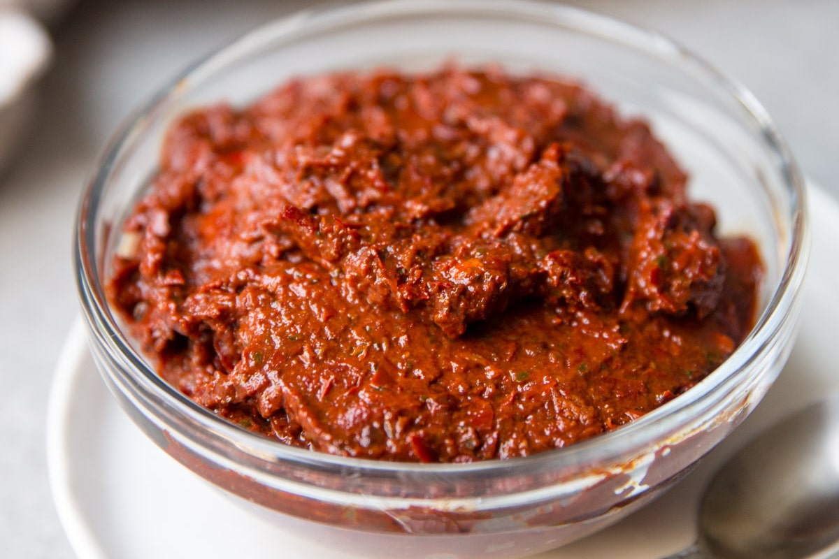 Harissa in a clear bowl.