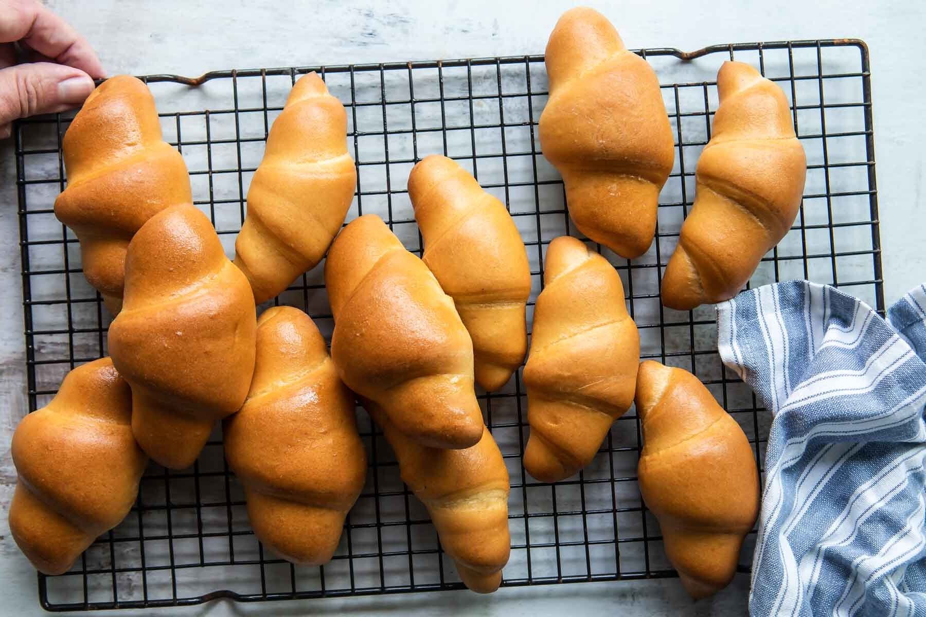 Crescent rolls on a cooling rack.
