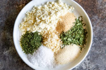A dish of homemade ranch dressing mix ingredients.