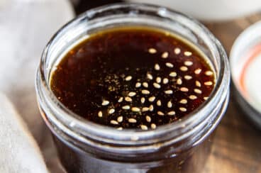 A glass jar of homemade teriyaki sauce.