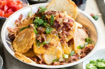 Irish nachos in a silver serving dish.