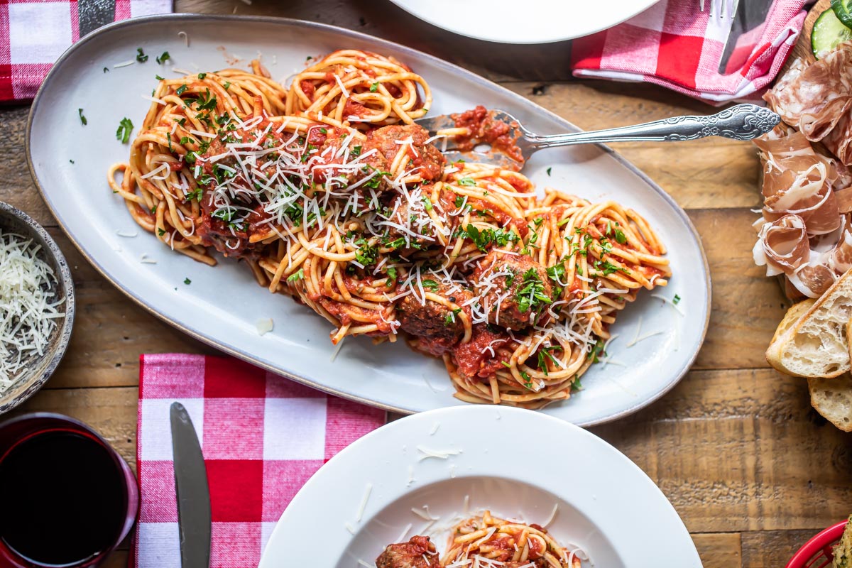 A platter of spaghetti and meatballs.