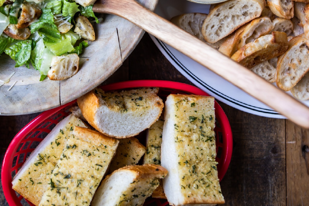 A spread of Italian food on a wooden table.