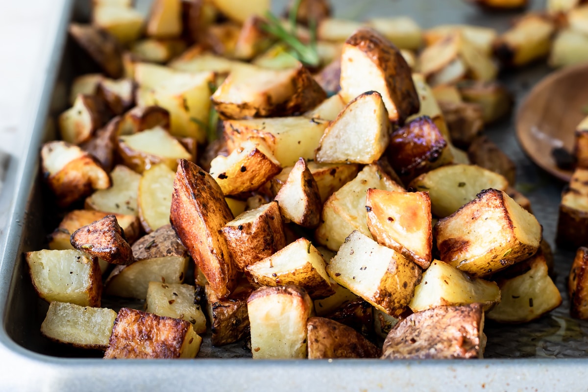 Oven roasted potatoes on a baking sheet.