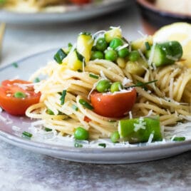 Pasta primavera on a plate.