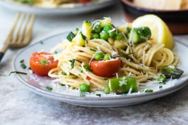 Pasta primavera on a plate.