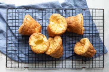 Baked popovers in a popover pan.