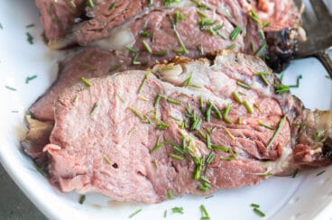 A platter of sliced prime rib.