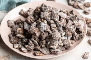Puppy chow on a beige platter.