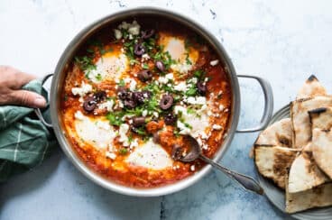 Shakshouka in a silver pan.