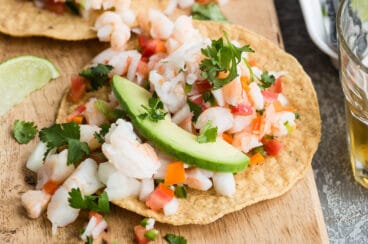 A tostada with shrimp ceviche on top.