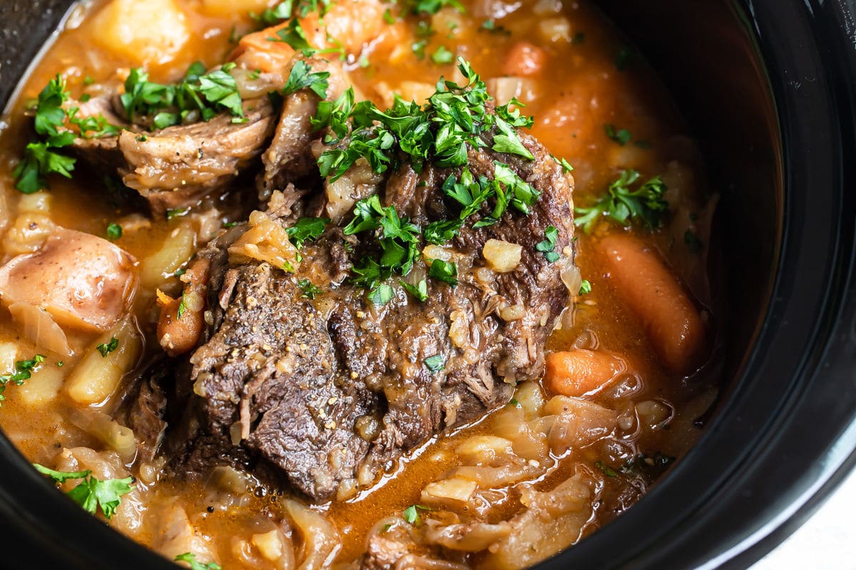 Pot roast in a slow cooker.