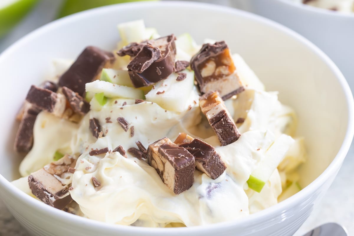 A bowl of snickers salad.
