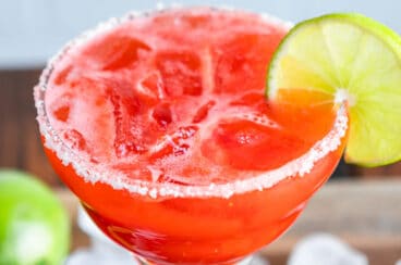 A strawberry margarita on the rocks.