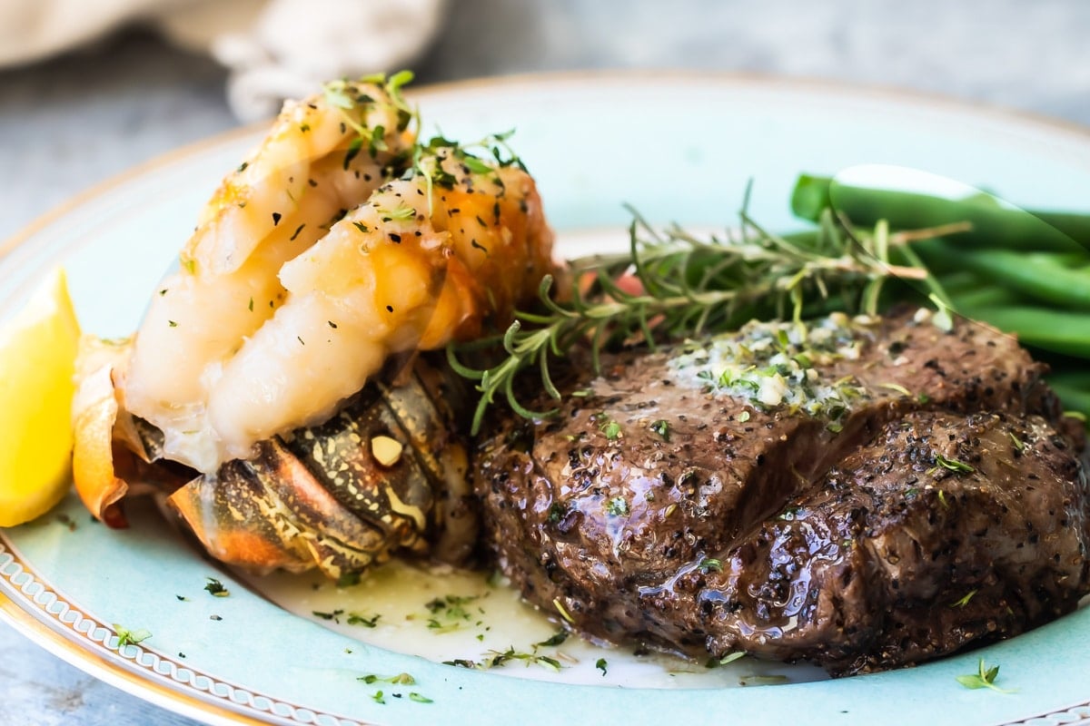 Surf and turf on a blue plate.