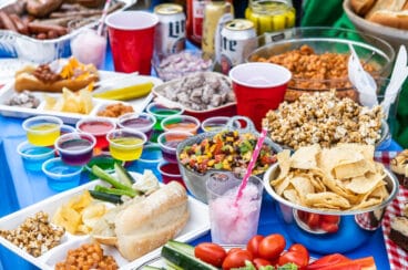 A tailgating spread set up at the back of a car.