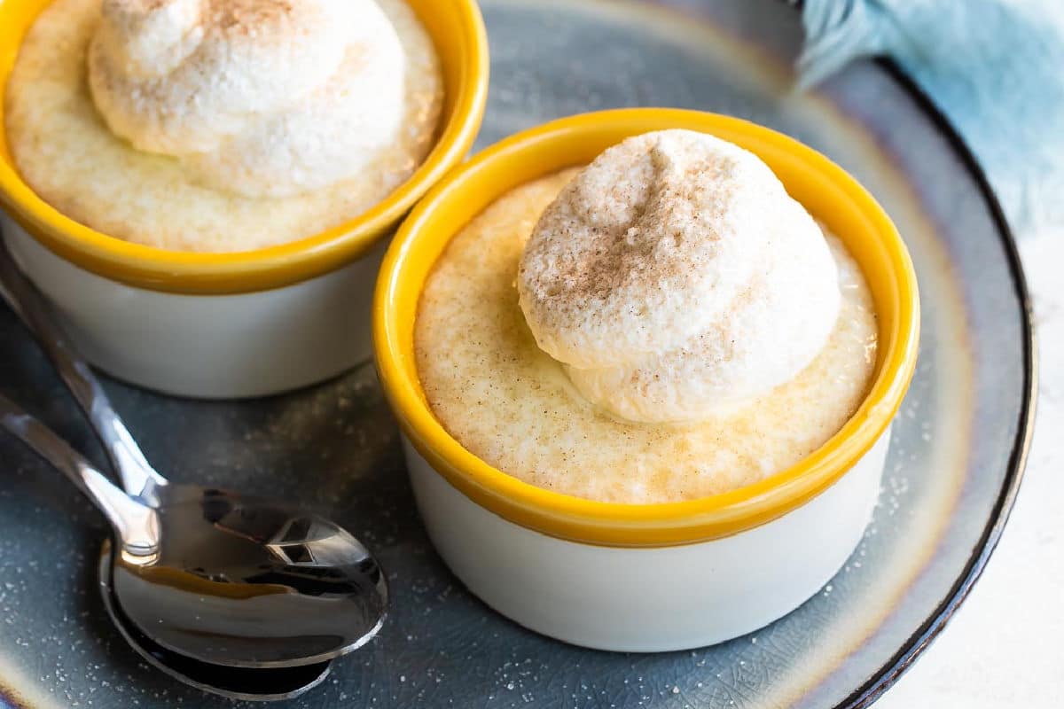 Tapicoa pudding in two ramekins on a gray plate.