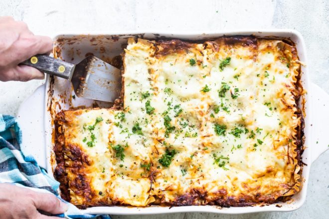The best make ahead lasagna in a white baking dish.