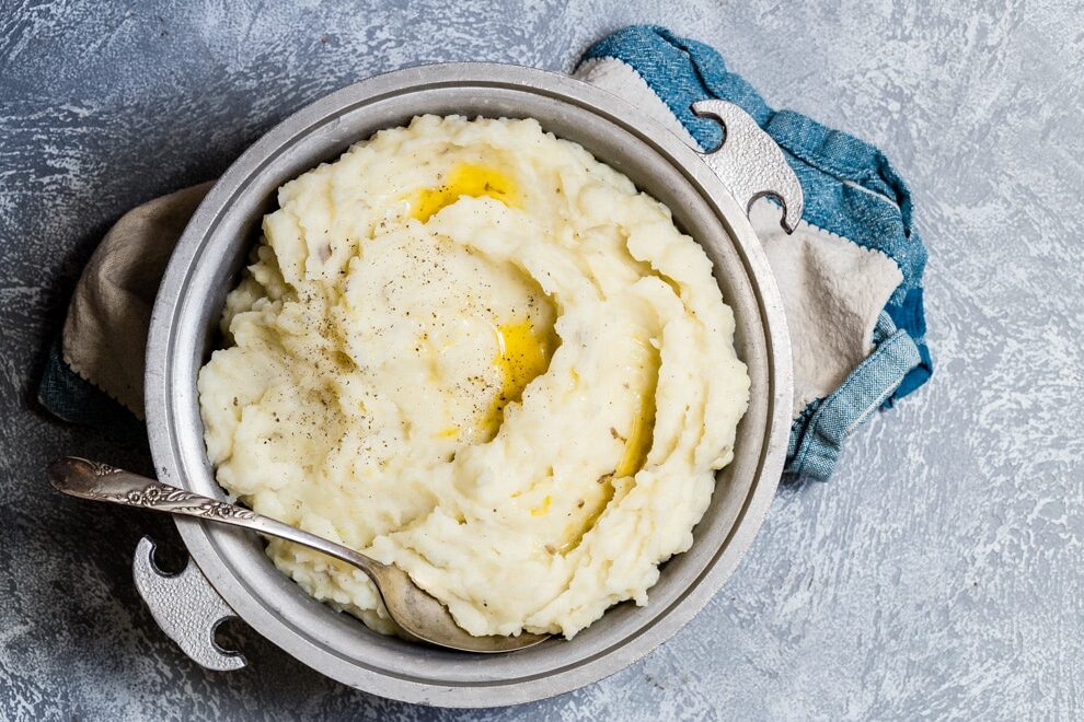 The Best Mashed Potatoes in the world barely even need a recipe, they're so easy to whip up. All it takes is three ingredients to make perfect homemade potatoes that absolutely hit the spot with every fluffy forkful.