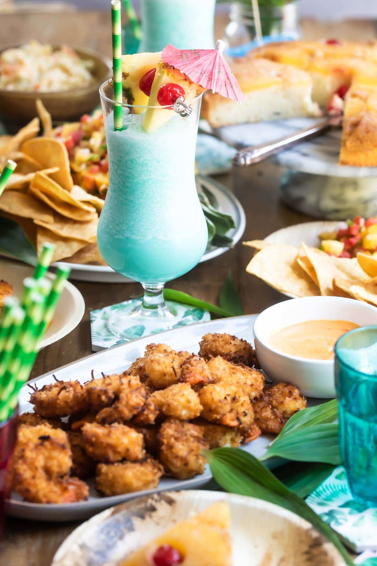 A table setting for a tropical party.